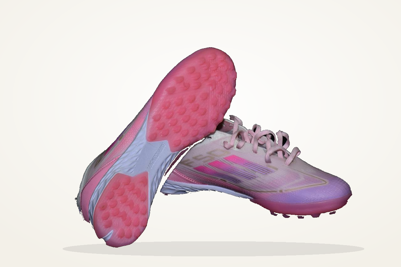 Pink football turf shoes